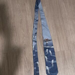 Fornasetti Blue and Gray Necktie with Skating Motif